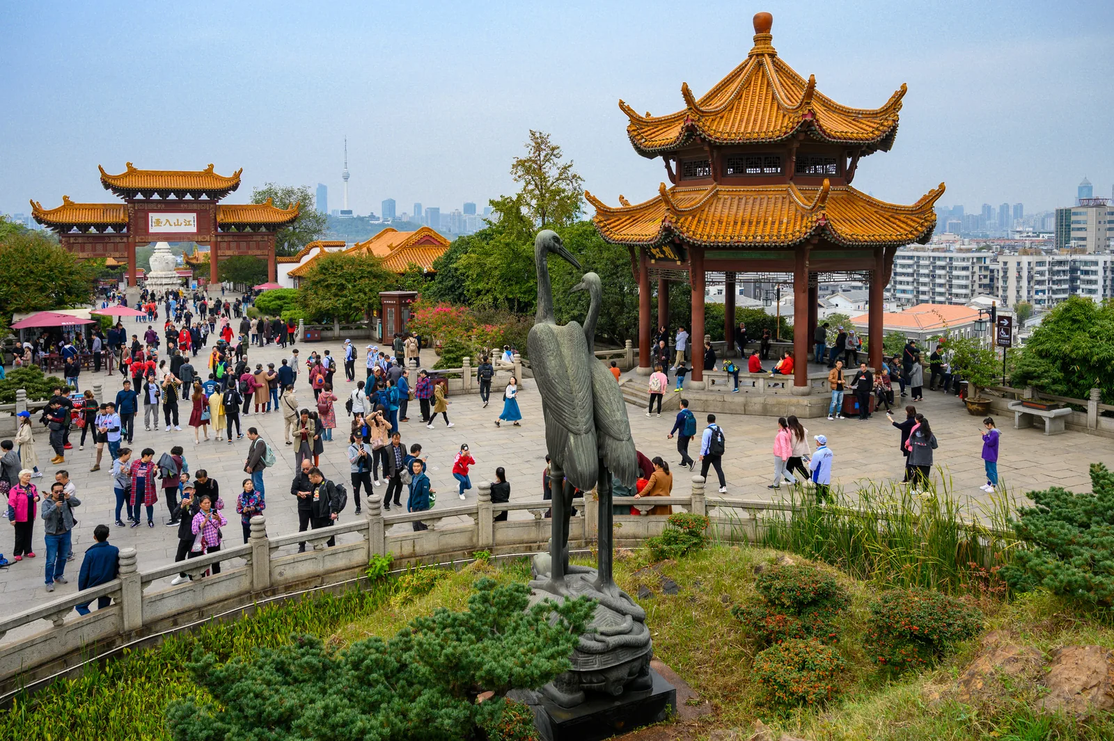 Visitors in the courtyards below Yellow Crane Tower in Wuhan