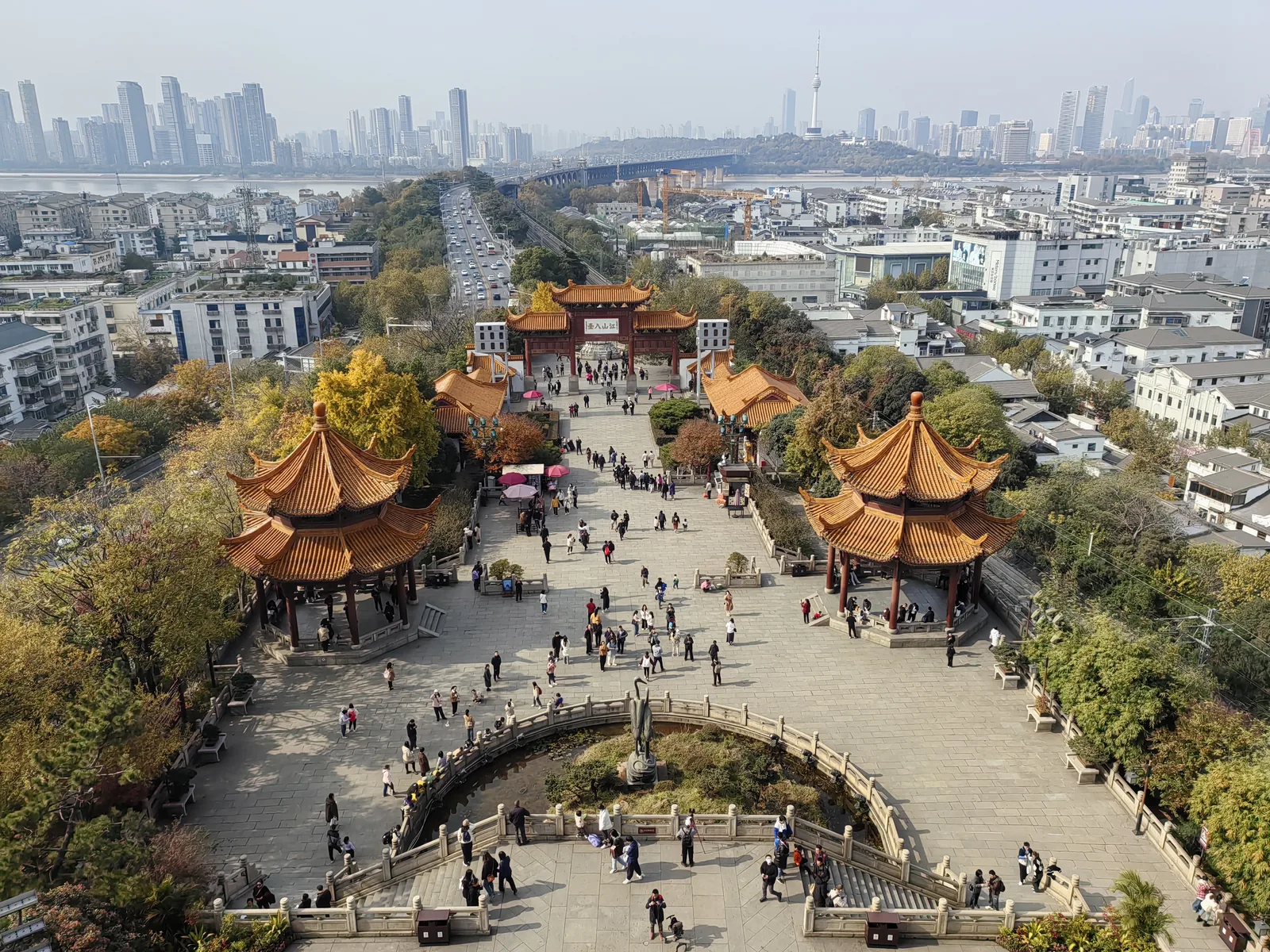 Pavilions and Wuhan cityscape seen from Yellow Crane Tower, with the Yangtze River beyond